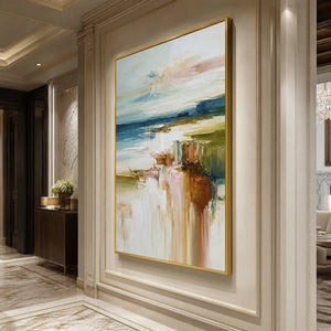Textured abstract coastal landscape painting in gold frame with blue, white and earthy tones