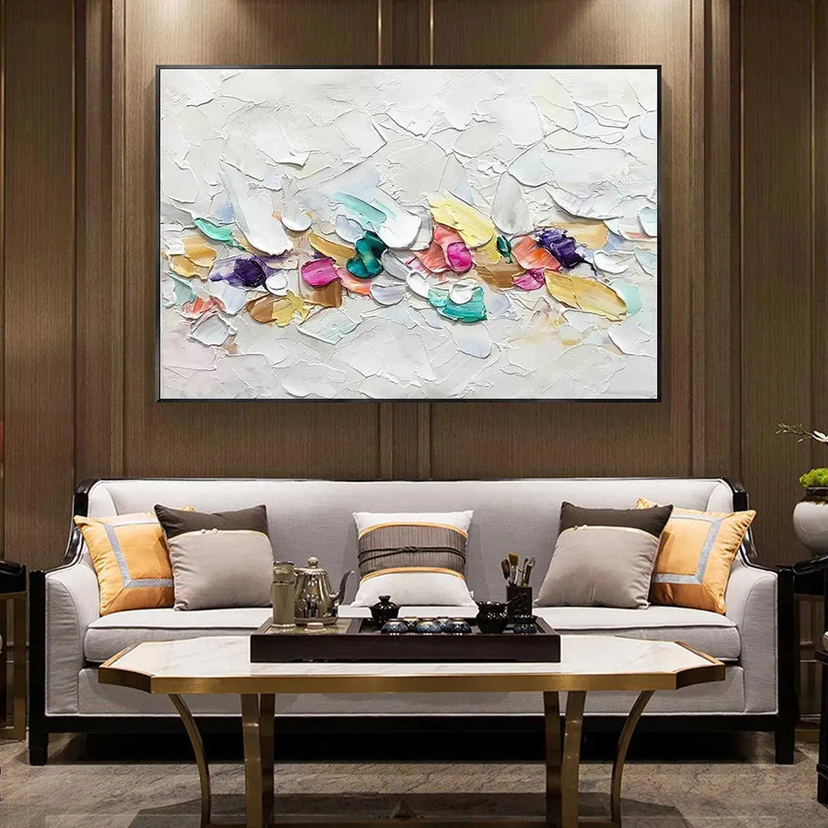 Confetti Dream abstract painting, pastel rainbow impasto on white, Willow Davies artwork above a sofa.