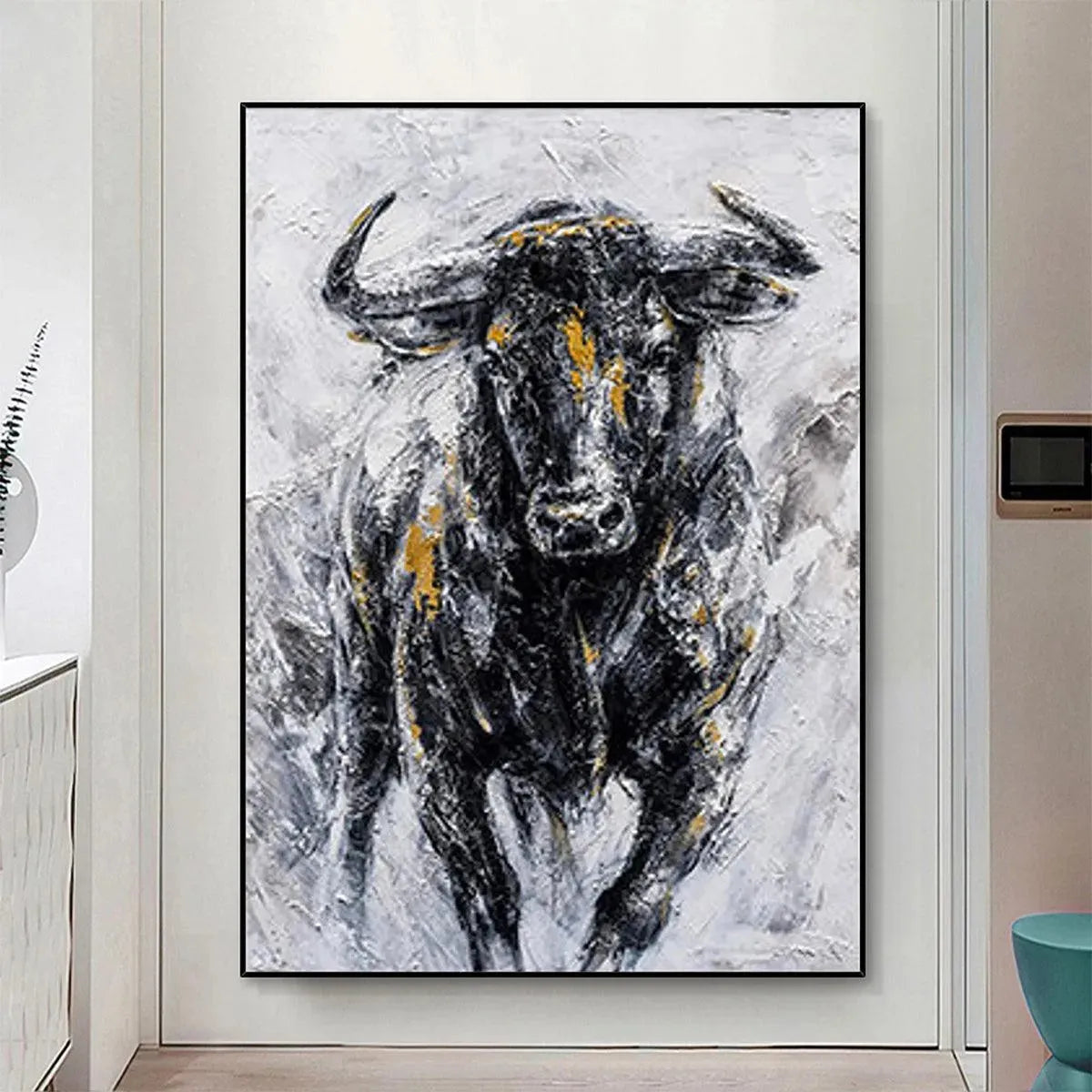 Charging bull textured painting, vertical wall art with black, white, and gold accents.
