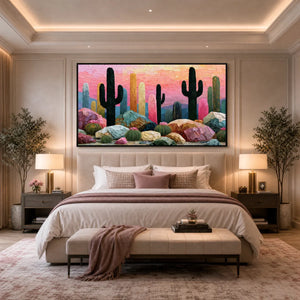 Textured impasto cactus landscape painting with pink sunset tones above a luxury bedroom bed