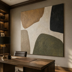 Organic neutral abstract wall art with earthy shapes in beige, green, black and gold in a modern office.