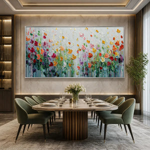Colorful textured impasto flower field painting above modern dining table
