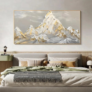 Golden Peaks painting, textured mountain landscape in gold and grey, framed art for bedroom decor by Isabella Rossi.