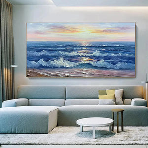Golden Sunset Serenade panoramic ocean sunset painting above modern gray sectional sofa in contemporary living room.