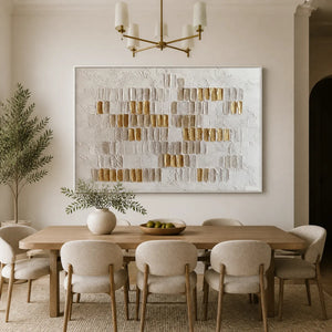 White and gold relief abstract wall art with sculpted texture in a luxury living room displayed in a refined dining room.
