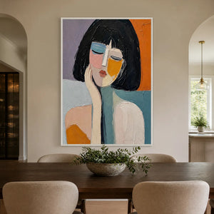 Modern abstract portrait canvas art with a white frame, serving as wall decor in a bright, elegant dining room.