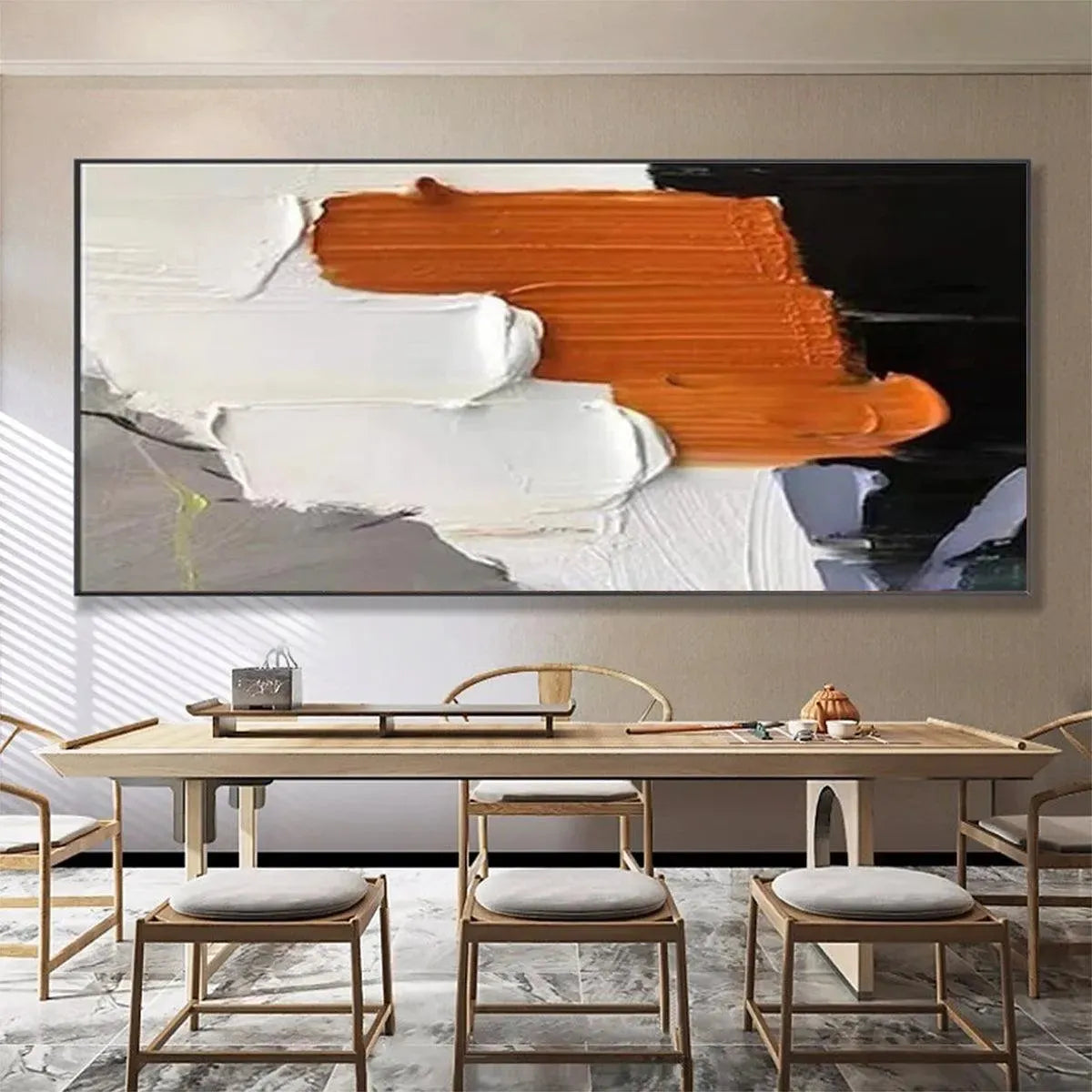 ORANGE BURST: Isabella Rossi's modern textured impasto abstract wall art in orange, white, and black, in a dining room.