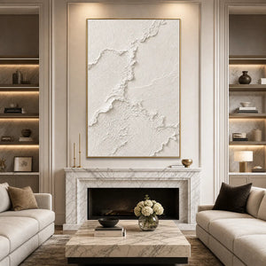 Heavily textured white minimalist Wabi Sabi wall art above marble fireplace