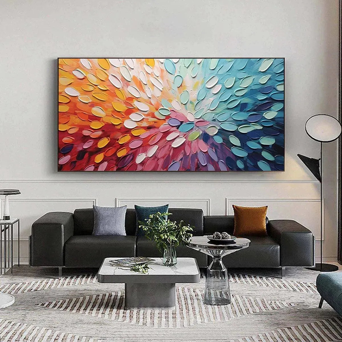 Rainbow Burst abstract painting by Willow Davies, vibrant impasto texture, horizontal artwork shown in a modern living room.