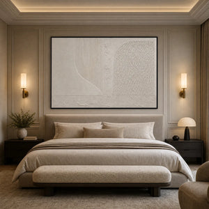 Textured minimalist Wabi Sabi wall art with white abstract relief in a modern bedroom
