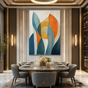 Textured geometric abstract oil painting in blue, orange, and gold above modern dining table