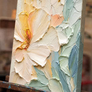 Close-up detail of Pastel Magnolia showing hand-painted texture and part of the frame