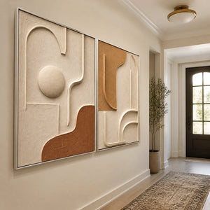 Modern Relief Pair in a refined entry hall with silver frame