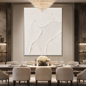 White textured abstract wall art above a luxury dining table in a modern neutral room