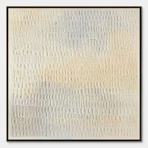 White textured abstract wall art with raised plaster relief in a minimalist frame