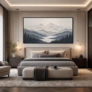 Textured monochrome mountain lake landscape wall art above a modern bed