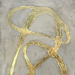 Close-up of textured abstract art featuring raised gold lines on a matte gray background, highlighting artisanal quality.