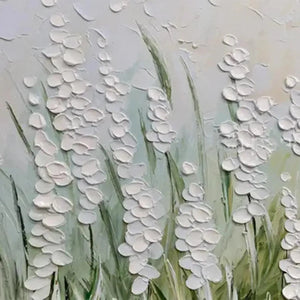 Close-up of impasto painting with raised white floral texture and green stems, highlighting sculptural paint detail.