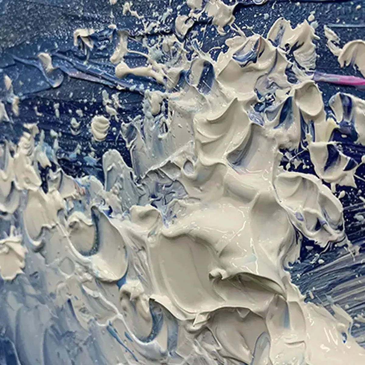 Detail of "Golden Sunset Serenade" painting's impasto: thick, sculptural white foam on deep blue ocean waves.