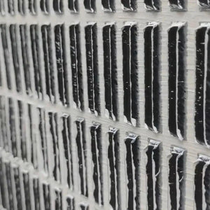 WOVEN TEXTURE painting, close-up of grey and white textured grid pattern by Javier Ramirez, showcasing dimensional detail.