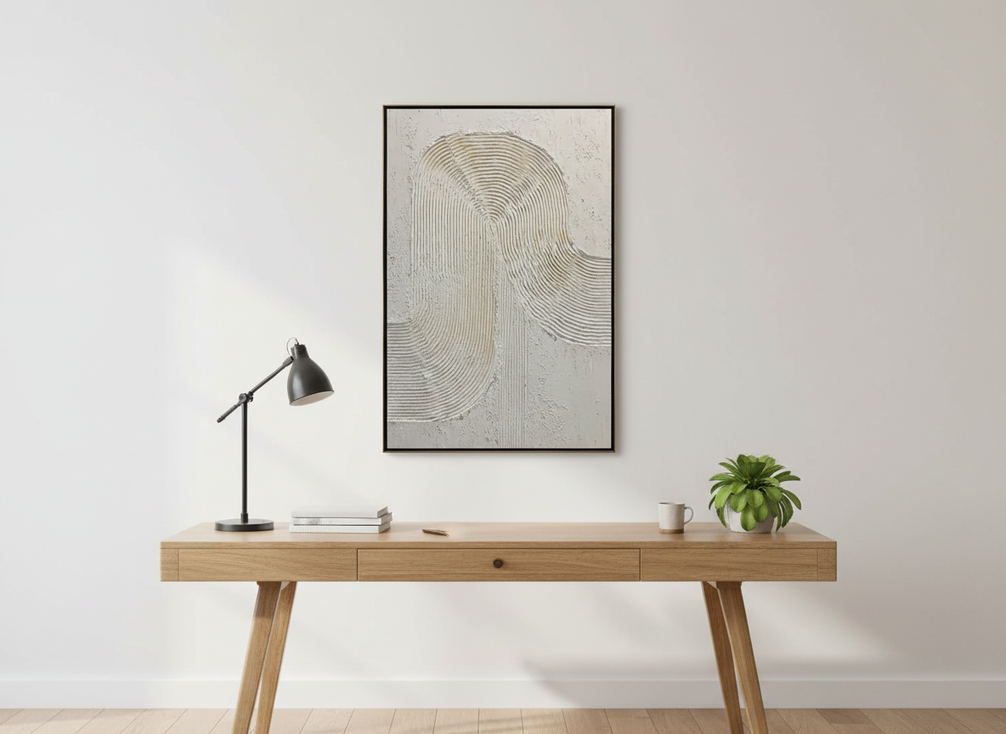 Minimalist textured abstract wall art in neutral tones styled above a desk in a calm home office