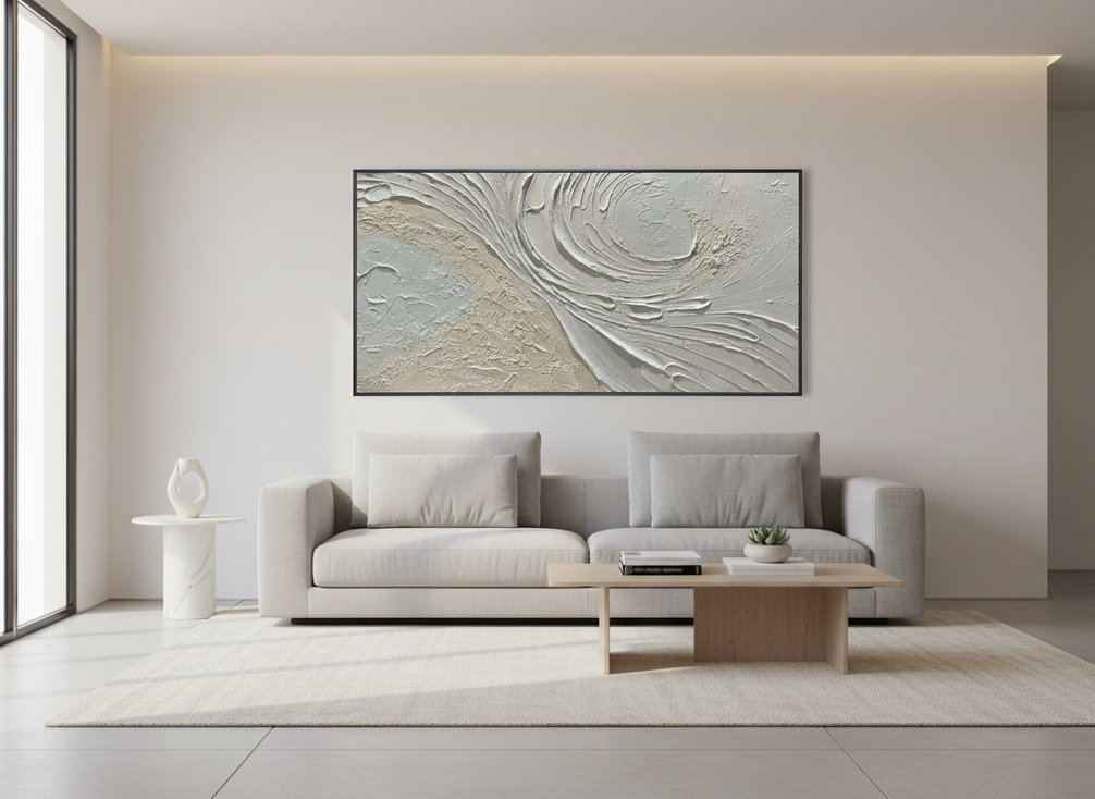 Large abstract painting above a sofa in a modern living room with balanced proportions and open wall space