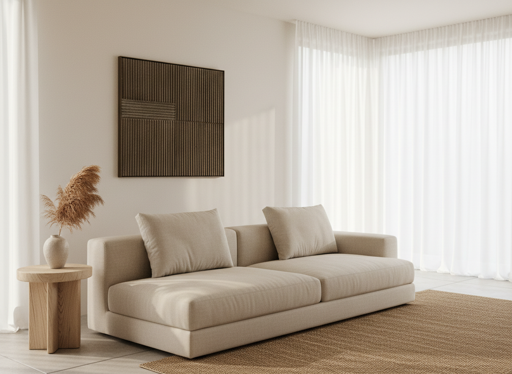 Textured neutral abstract wall art in a calm Japandi living room above a simple sofa