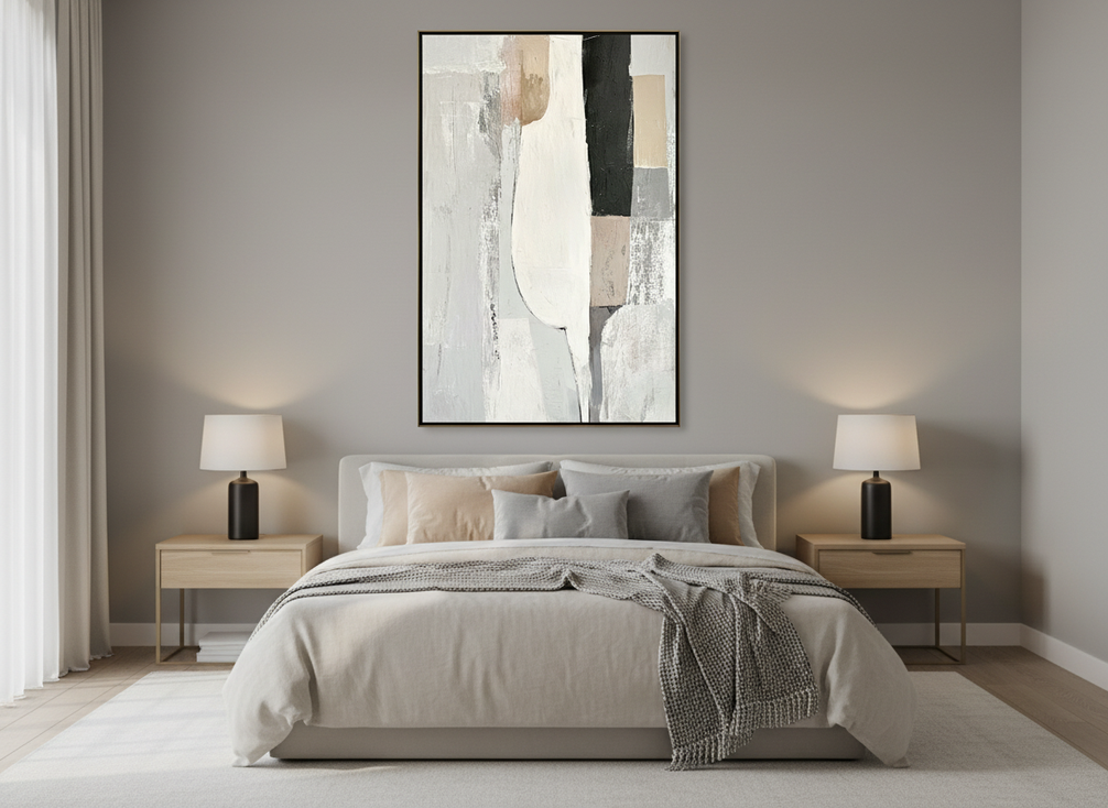 Textured abstract wall art in warm neutral tones displayed above a bed in a calm bedroom