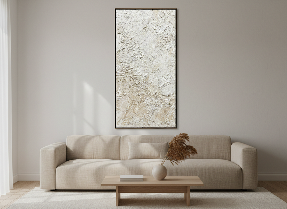 Textured wabi-sabi abstract wall art in a calm living room above a simple sofa with soft neutral decor