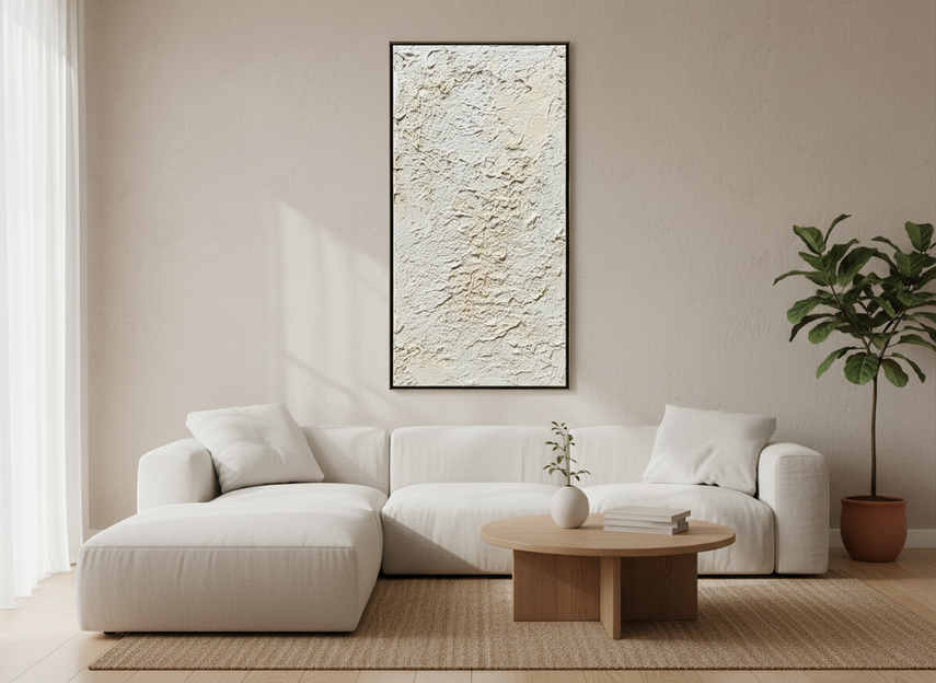Textured neutral abstract wall art in a calm living room setting