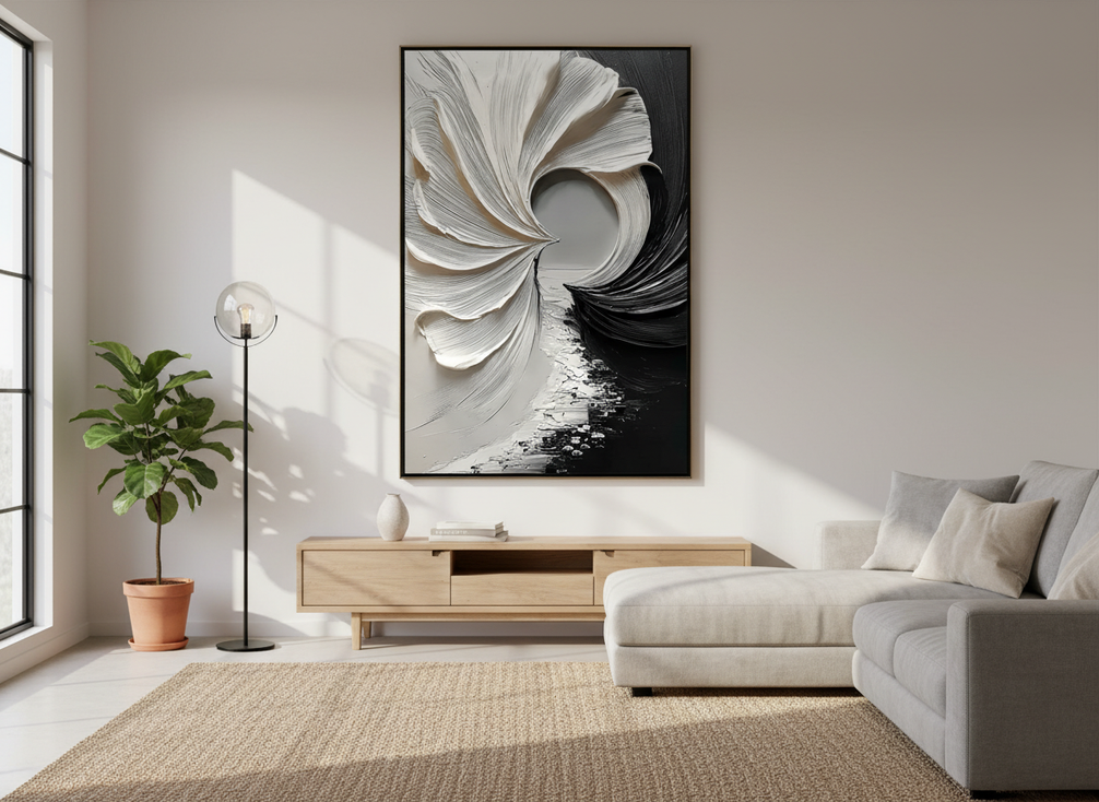 Original textured abstract wall art with visible raised surface in a modern living room, shown in angled side light
