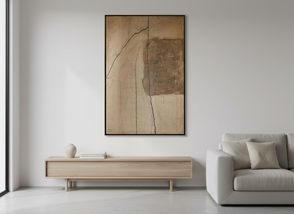 Textured abstract wall art in a modern living room with soft natural light
