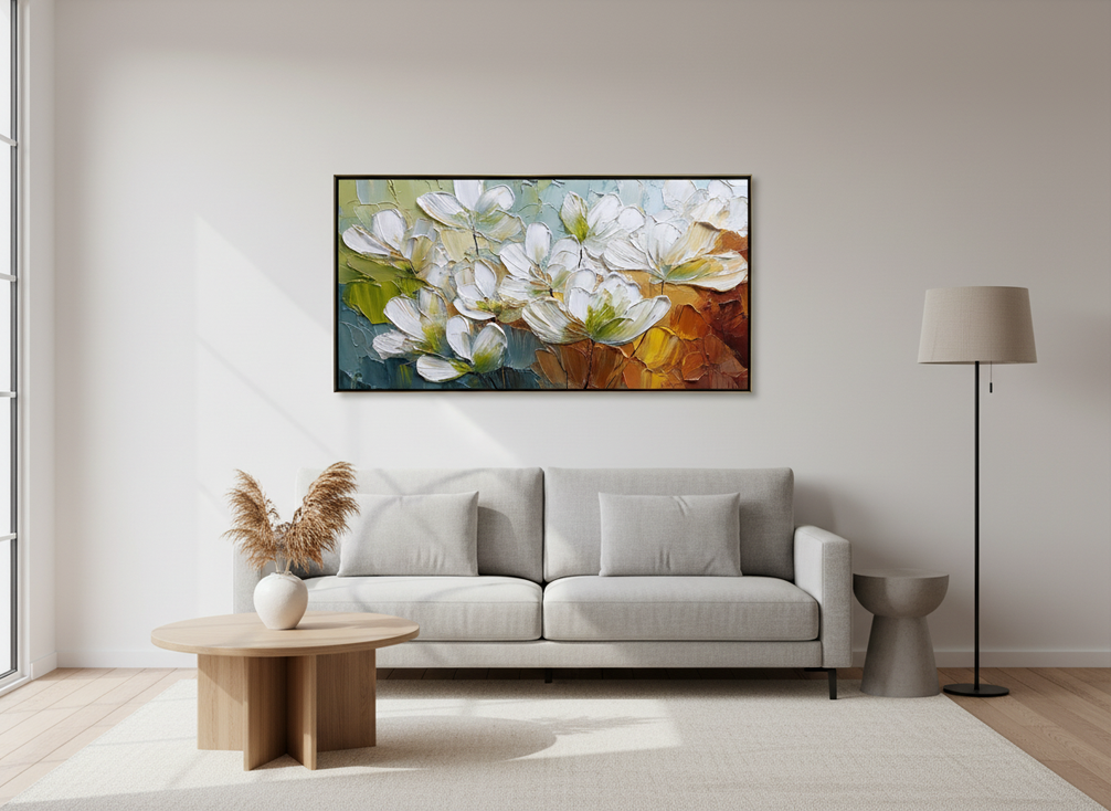 Modern textured floral wall art above a neutral sofa in a bright contemporary living room