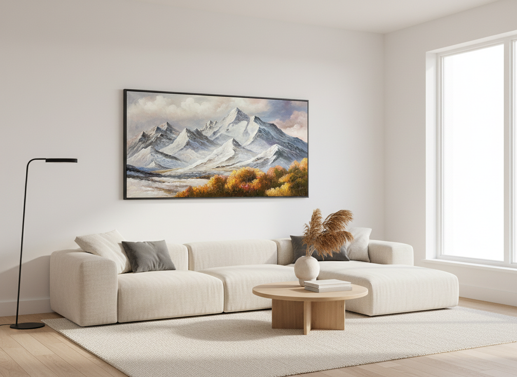 Original landscape painting displayed on a wall in a styled living room