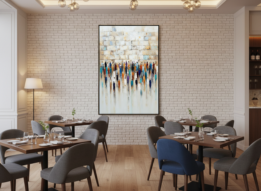 Textured abstract figurative wall art in a restaurant dining room, viewed from a seated table under warm ambient lighting