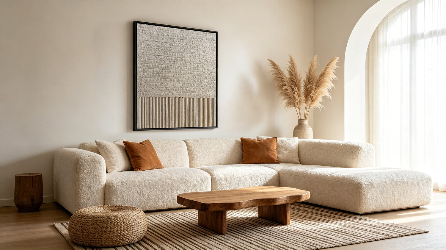 Minimalist living room with a large pampas grass arrangement.