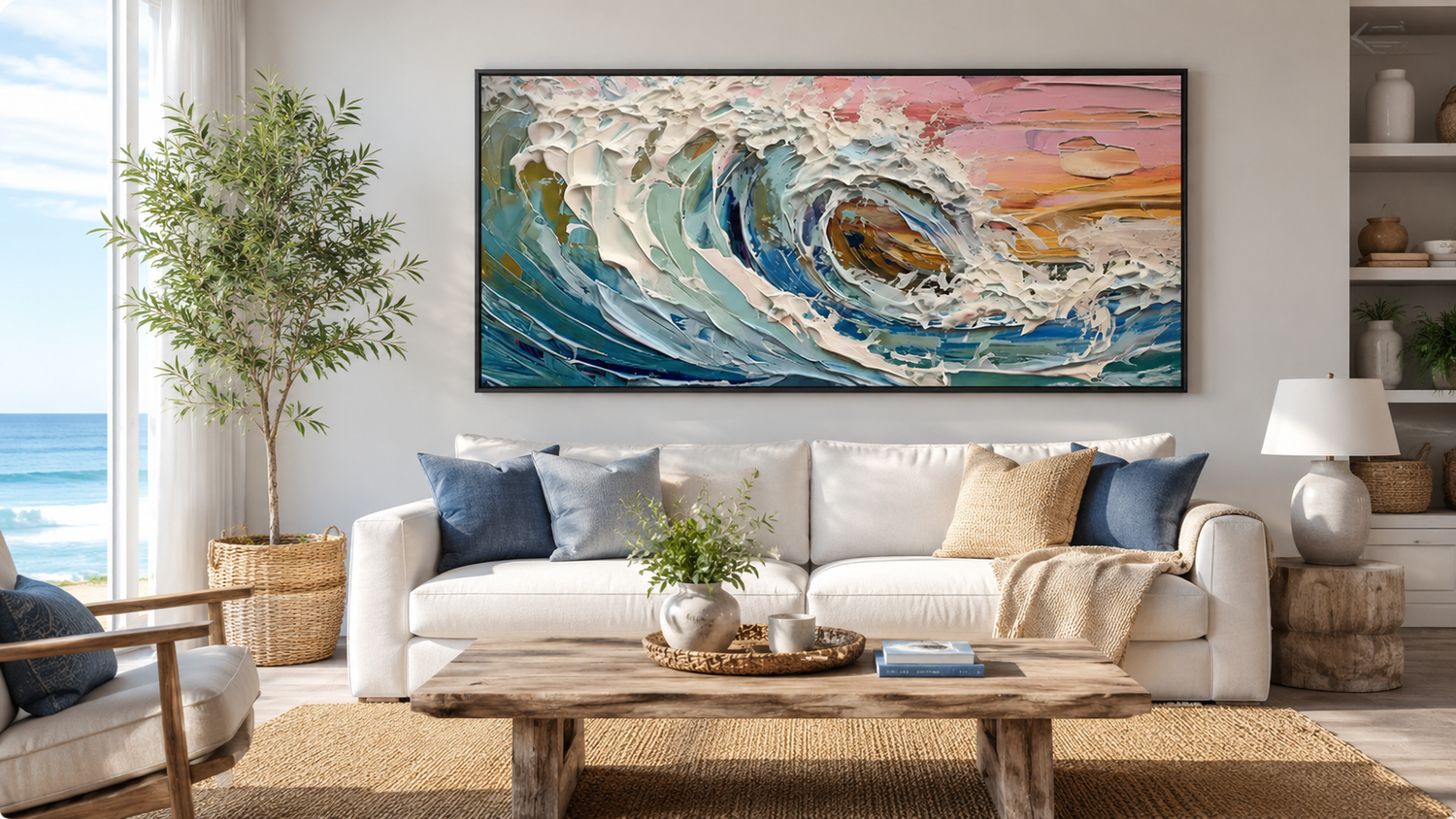 Blue ocean wave textured wall art above a bright living room sofa