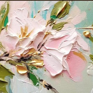 Close-up texture of Golden Blush impasto painting: pink flowers, gold accents, green leaves, light blue background.