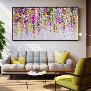 Wisteria Cascade textured impasto painting of cascading pink, purple, and green blossoms, showcased in a modern living room.