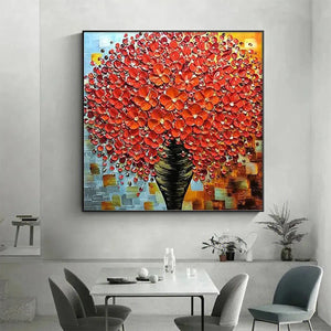 Crimson Bouquet impasto oil painting with textured red flowers in black vase displayed in modern dining room.