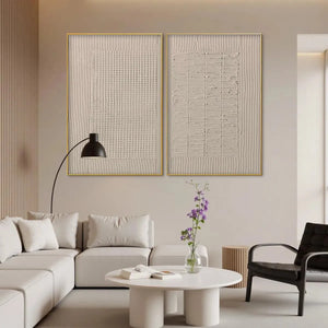 Textured Grid Duo by Javier Ramirez in beige, abstract art with gold frames, adding modern elegance to a living room.