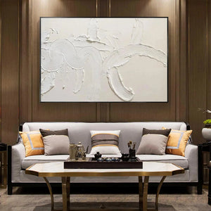 White textured abstract painting by Liam O'Connell in a living room, Wabi Sabi style, with a sofa and marble coffee table