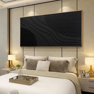 Black textured painting with wave and linear patterns, displayed above a bed in a minimalist bedroom.