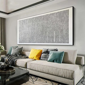 Javier Ramirez minimalist grey and white woven texture painting in a modern living room setting