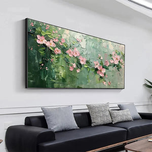 Textured pink floral painting 'Spring Blossom' by Elodie Dubois hanging above a sofa.