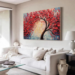 HEART TREE textured impasto red tree painting with heart-shaped leaves displayed in a modern living room.