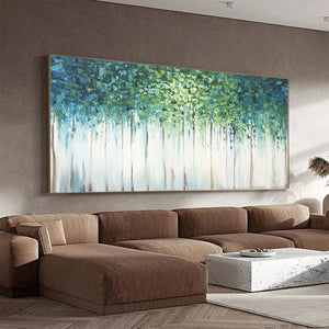 Emerald Forest abstract forest painting with green foliage and dripping effects above modern sectional sofa.