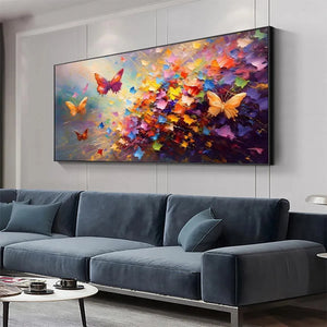 Colorful butterfly painting by Willow Davies, "Butterfly Flight" oil on canvas in living room setting. Vibrant impasto art.