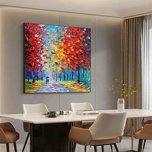 Vibrant 'Autumn Walk' impasto artwork, featuring a couple in an autumn forest, complementing a contemporary dining room.