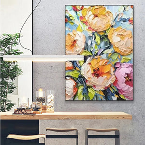 Summer Bloom impasto floral painting by Elodie Dubois in a modern living room. Textured yellow, peach, and pink flowers.